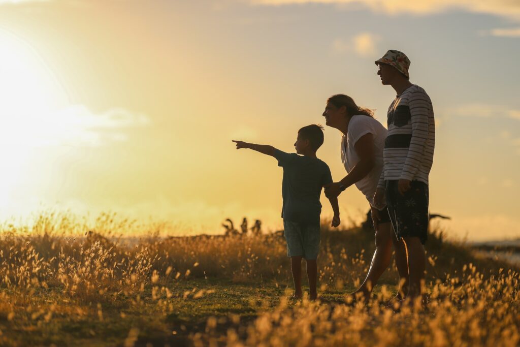 family in the sunset outdoors