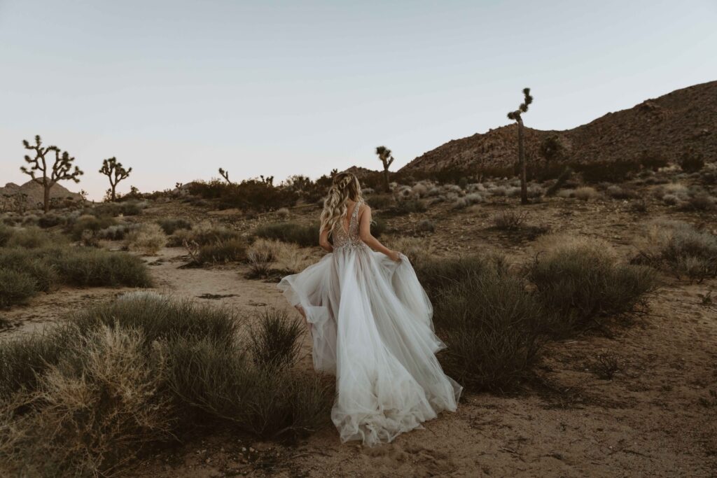 woman in a wedding dress on the sand dunes
