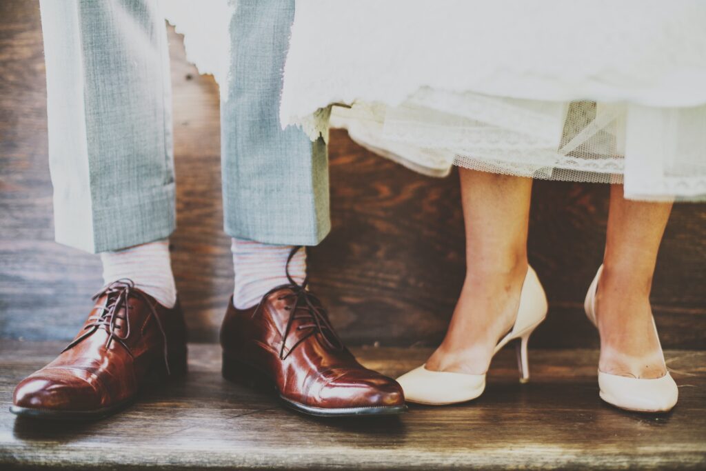 long distance wedding planning view of bride and groom's shoes
