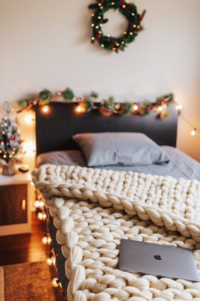 save money on heating bills - pic of a cosy bed