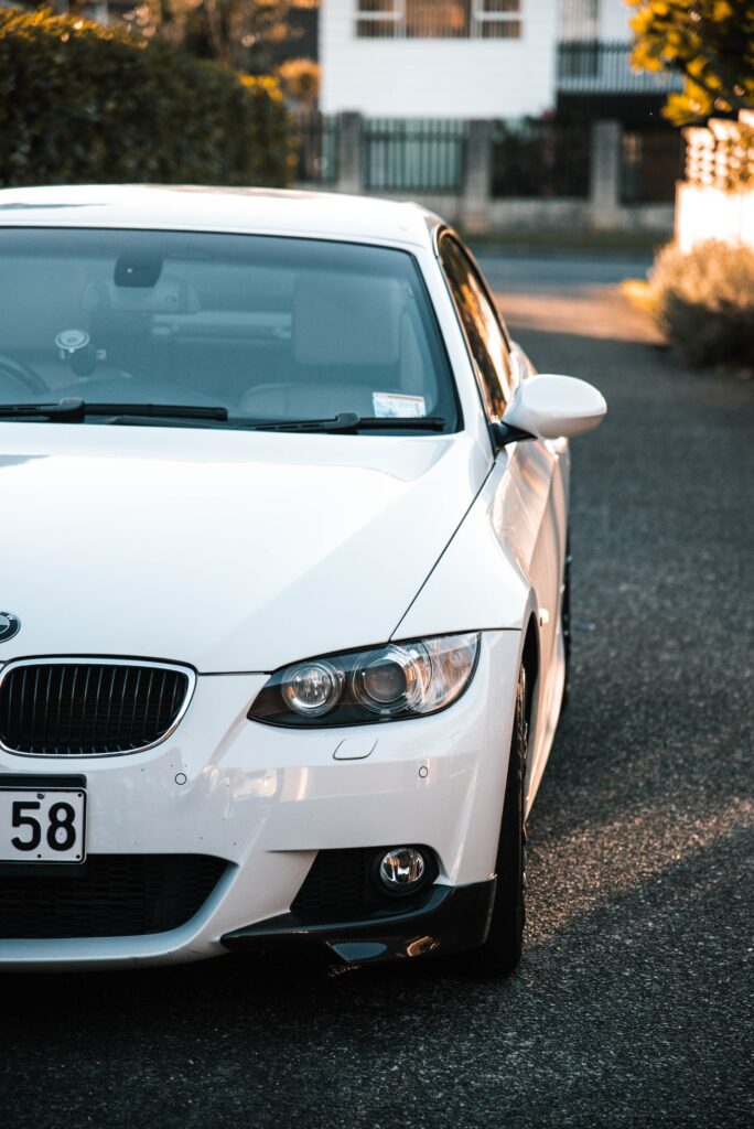 white car parked on drive
