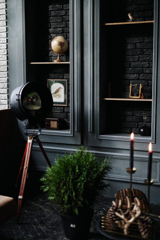 dark painted wall and dresser