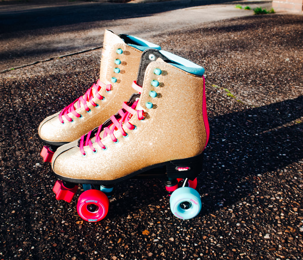 gold rollerskates