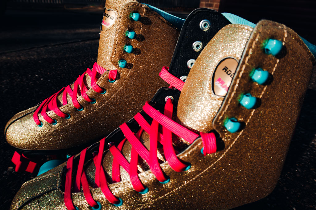 Shiny gold rollerskates